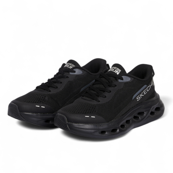 Skechers MAX CUSHIONING GLIDE-STEP – Smooth Comfort & Everyday Performance in Black