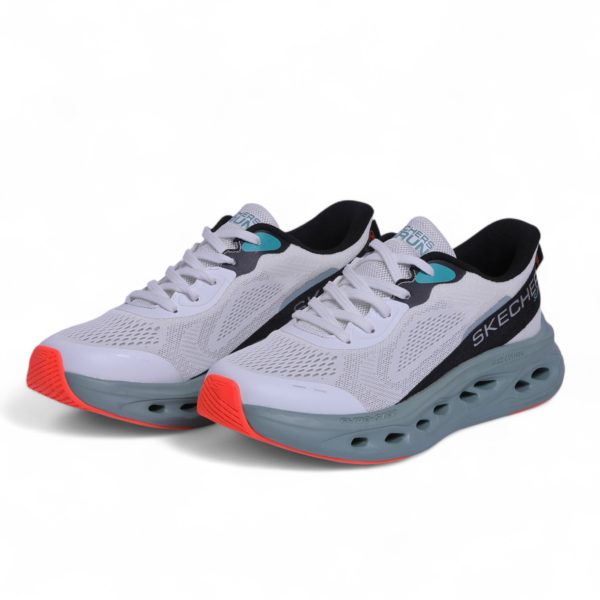 Skechers MAX CUSHIONING GLIDE-STEP – Smooth Comfort & Everyday Performance in White