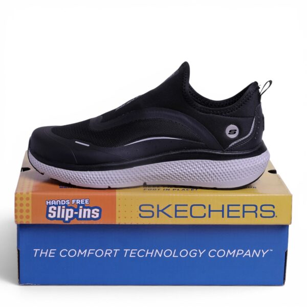 Skechers Ultra Flex Slip-ins in Black & white